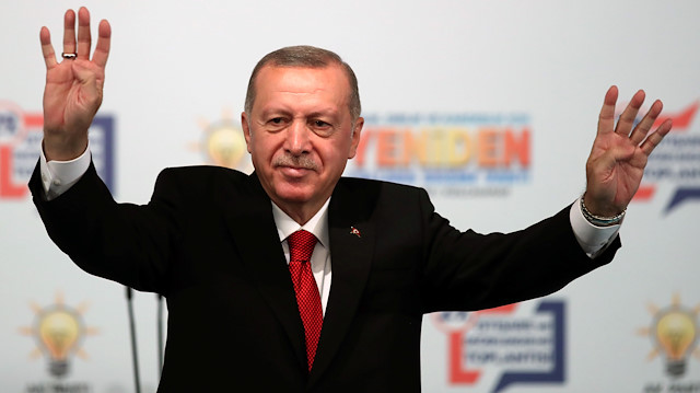 Turkish President Tayyip Erdogan greets members of his ruling AK Party during a meeting in Ankara, Turkey, October 5, 2019. Murat Kula/Presidential Press Office/Handout via 