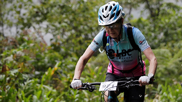 Mirtha Munoz a 70-year-old runner participates in the Sky Race, Bolivia's toughest cycling competition - Bolivia Skyrace - Yolosa, La Paz, Bolivia - October 5, 2019 Mirtha Munoz in action during the Sky Race. The route known as "The way of death" to reach 4000 meters in the Andean mountains. REUTERS/David Mercado

