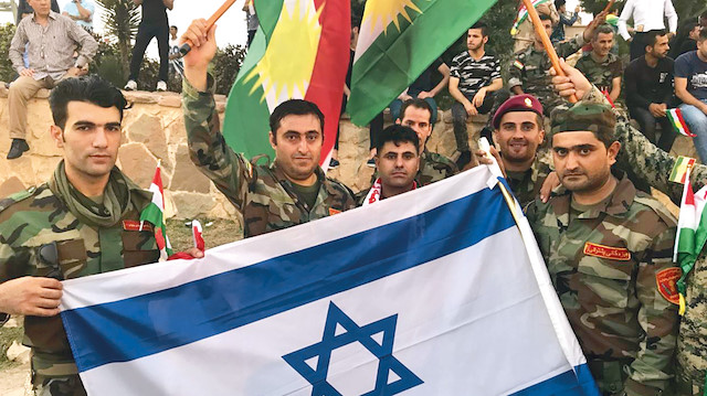 Eylül 2017 tarihinde, Irak’ın kuzeyinde yapılan sözde “Bağımsızlık referandumu” öncesi peşmerge güçleri İsrail bayraklarıyla poz vermişti.