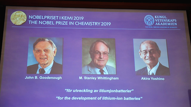 A screen displays the portraits of the laureates of the 2019 Nobel Prize in Chemistry (L-R) John B. Goodenough, M. Stanley Whittingham, and Akira Yoshino "for the development of lithium-ion batteries" during a news conference at the Royal Swedish Academy of Sciences in Stockholm, Sweden, October 9, 2019