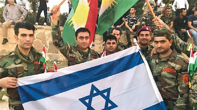 In 2017, Peshmerga forces were seen waving Israel's national flags in Erbil
