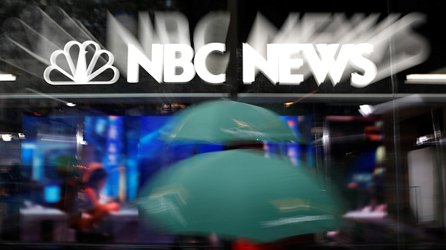 An NBC News sign and logo are seen outside the NBC News 