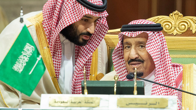 FILE PHOTO: Saudi Arabia's Crown Prince Mohammed bin Salman talks with Saudi Arabia's King Salman bin Abdulaziz Al Saud 