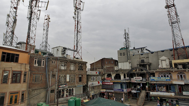 File photo: A view of telecom towers installed over the buildings is pictured in Srinagar