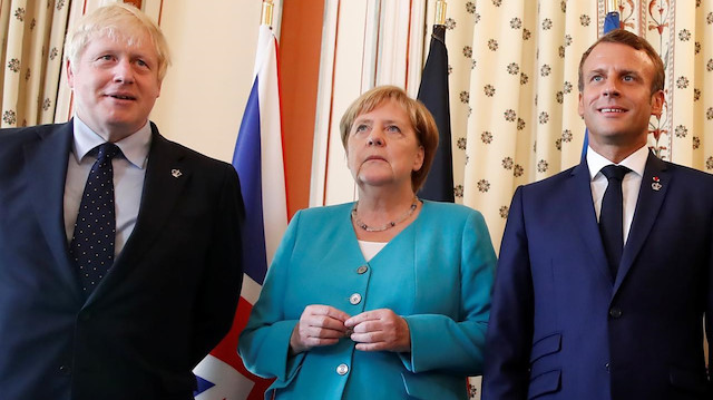 İngiltere Başbakanı Boris Johnson, Almanya Başbakanı Angela Merkel ve Fransa Cumhurbaşkanı Emmanuel Macron.
