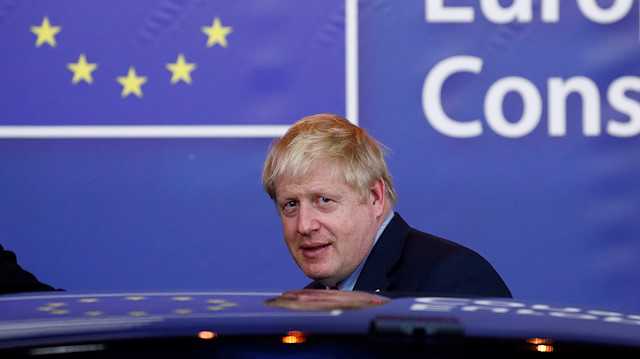 Britain's Prime Minister Boris Johnson leaves the European Council after the Brexit-dominated European Union leaders summit in Brussels, Belgium October 18, 2019.