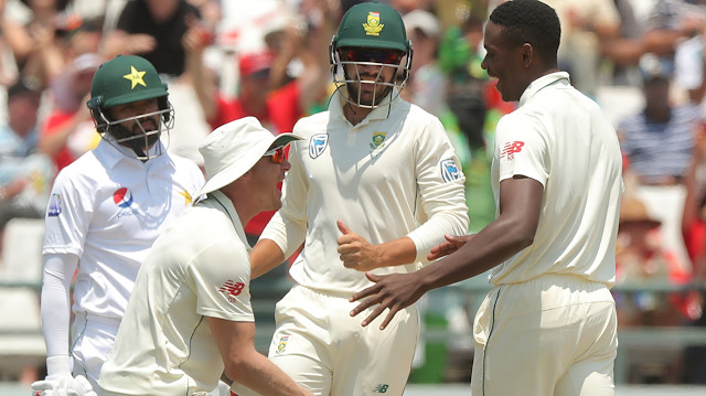 Cricket - South Africa v Pakistan - Second Test - PPC Newlands, Cape Town, South Africa - January 5, 2019 South Africa's Kagiso Rabada celebrates the wicket of Pakistan's Azhar Ali with team mates REUTERS/Mike Hutchings