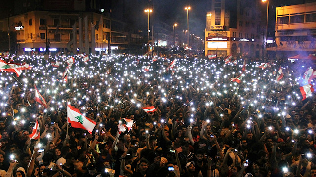 Demonstrators take part in an anti-government protest in Tripoli, Lebanon