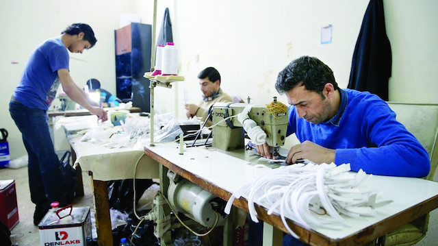 Fotoğraf: Arşiv / Tekstil atölyelerinde çalıştırılan yabancı uyruklu işçiler.