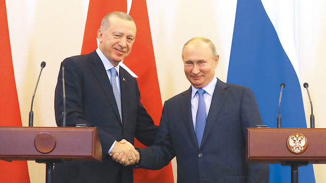 Recep Tayyip Erdoğan (sol) Vladimir Putin (sağ)