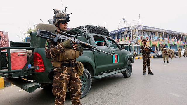 File photo: Afghan security forces keep watch during the presidential election in Jalalabad