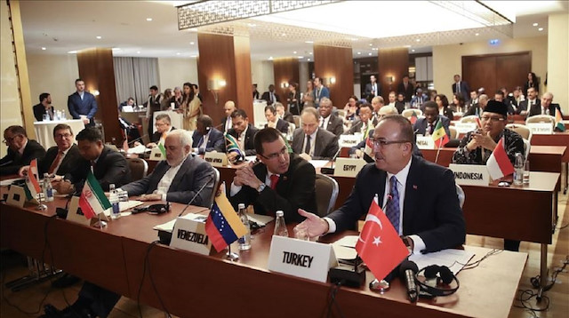 Turkish Foreign Minister Mevlut Cavusoglu (R), Iranian Foreign Minister Mohammad Javad Zarif (3rd R) and Foreign Minister of Venezuela Jorge Arreaza (2nd R) attend the meeting of Ministerial Committee on Palestine on sidelines of 18th summit of Non-Aligned Movement in Baku, Azerbaijan on October 23, 2019.