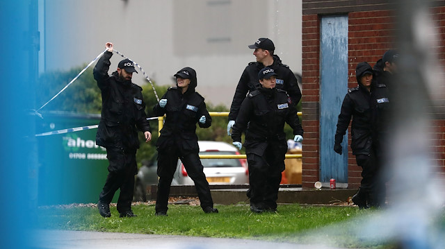 Police officers are seen at the scene where bodies were discovered in a lorry container, in Grays, Essex, Britain October 24, 2019
