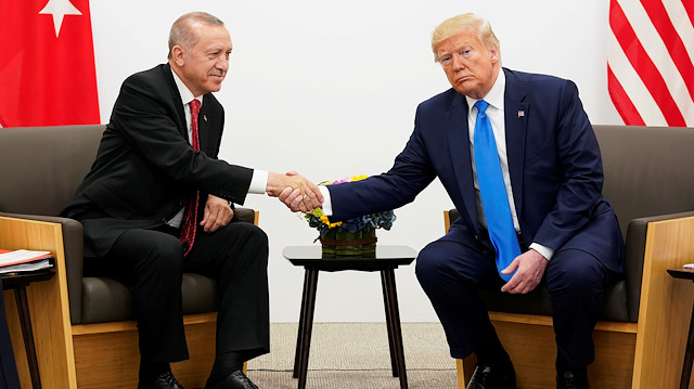 FILE PHOTO: U.S. President Donald Trump shakes hands during a bilateral meeting with Turkey's President Tayyip Erdogan during the G20 leaders summit in Osaka, Japan, June 29, 2019. REUTERS/Kevin Lamarque//File Photo

