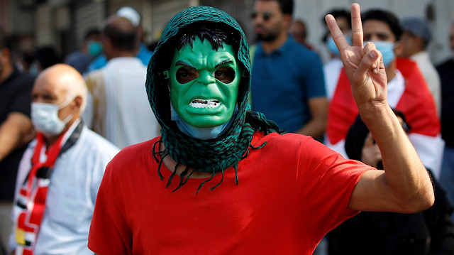 A demonstrator wears a Hulk mask during a protest over corruption, lack of jobs, and poor services, in Baghdad, Iraq October 29, 2019. REUTERS/Khalid al-Mousily

