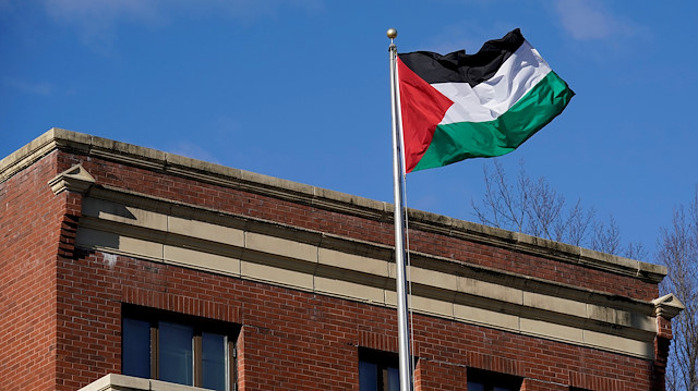 File photo: Palestinian flag waves at Palestine Liberation Organization office in Washington