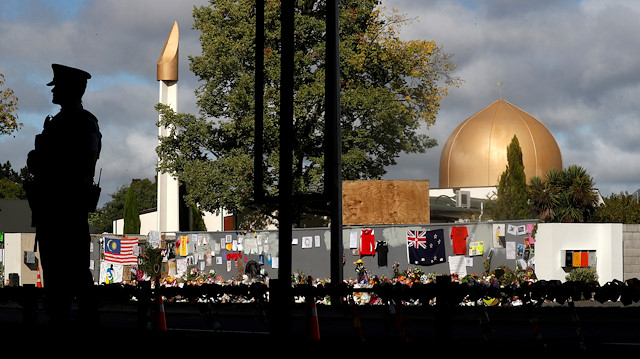 FILE PHOTO: A police officer stands guard outside Al Noor mosque in Christchurch, New Zealand, March 22, 2019. 