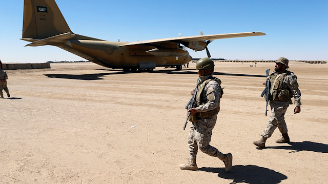 File photo: Saudi soldiers walk at an airfield where Saudi military cargo planes land to deliver aid in Marib, Yemen January 26, 2018. Picture taken January 26, 2018