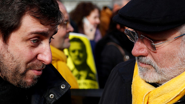 Dismissed Catalan politicians Toni Comin and Lluis Puig.