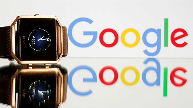 Fitbit Blaze watch is seen in front of a displayed Google logo in this illustration picture taken, November 8, 2019. REUTERS/Dado Ruvic

