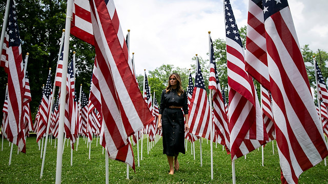 File photo: U.S. first lady Melania Trump visits a field of American flags