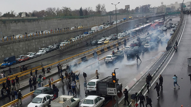 File photo: People protest against increased gas price, on a highway in Tehran, Iran November 16, 2019