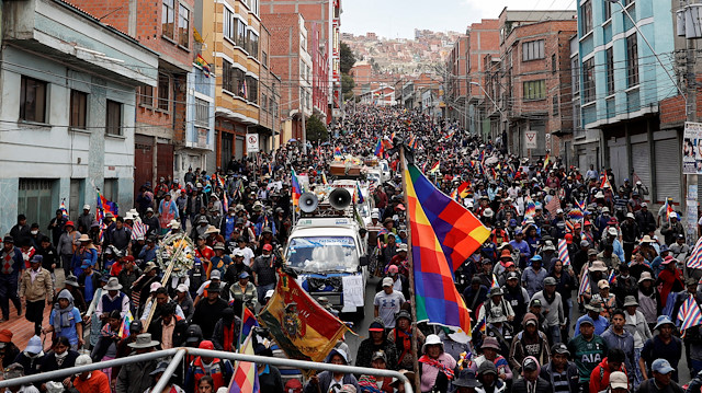 File photo: Supporters of former Bolivian President Evo Morales carry a coffin of people they say were killed during recent clashes with security forces in Senkata, as they take part in a protest, in La Paz, Bolivia