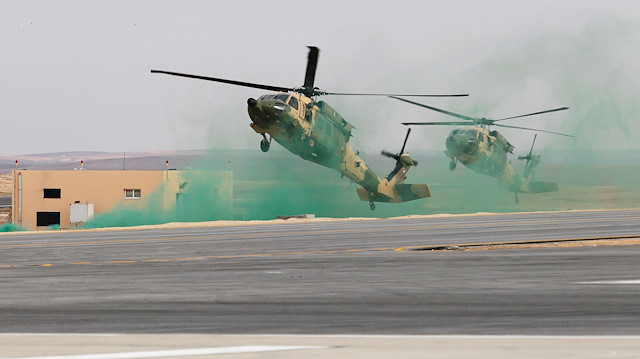 Jordanian army members participate in a hostage rescue drill during a Black Hawk helicopters handover ceremony to Jordan from the U.S. government, at a Jordanian military base near the town of Zarqa, Jordan, January 28, 2018.