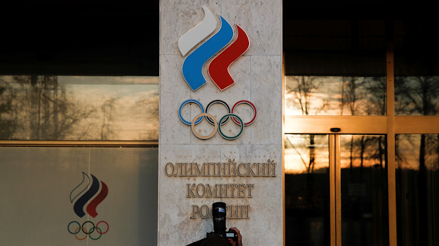 File photo: Photographer takes a picture of logo of Russia's Olympic Committee in Moscow, Russia November 23, 2019