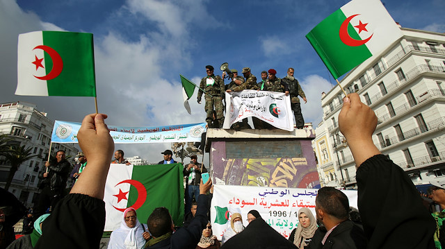 File photo: Pro-government supporters take part in a demonstration in favour of the upcoming presidential election in Algiers, Algeria December 9, 2019