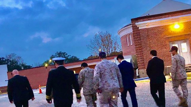 Saudi Arabia Defense Attache Major General Fawaz Al Fawaz and his Embassy staff and other officials arrive to meet with the Saudi students who remain restricted to the Naval Air Station (NAS) Pensacola base by their Saudi commanding officer, in Pensacola, Florida, U.S. December 9, 2019. Picture taken December 9, 2019. FBI Jacksonville/Handout via REUTERS THIS IMAGE HAS BEEN SUPPLIED BY A THIRD PARTY.  
