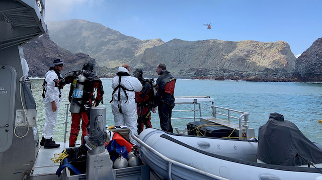 Members of a dive squad conduct a search during a recovery operation around White Island, which is also known by its Maori name of Whakaari, a volcanic island that fatally erupted earlier this week, in New Zealand, December 13, 2019 