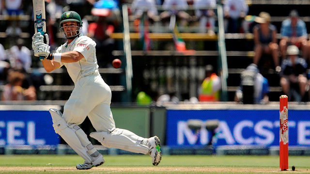 FILE PHOTO: South Africa's Mark Boucher hits out during the fourth cricket test match against England at the Wanderers ground, Johannesburg, January 16, 2010. REUTERS/Philip Brown/File Photo

