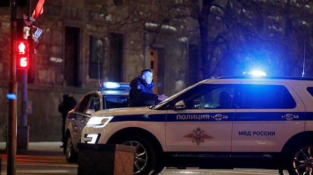 Police vehicles block a street near the Federal Security Service (FSB) building after a shooting incident, in Moscow, Russia December 19, 2019.