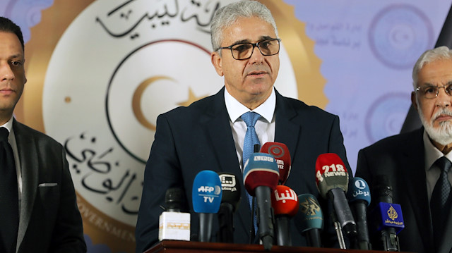 Interior Minister Fathi Ali Bashagha (C) speaks during a joint news conference with Foreign Minister Mohamed Taher Siala in Tripoli, Libya December 25, 2018. REUTERS/Hani Amara

