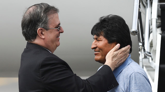 File photo: Bolivia's ousted President Evo Morales is welcomed by Mexico's Foreign Minister Marcelo Ebrard during his arrival to take asylum in Mexico, in Mexico City, Mexico, November 12, 2019