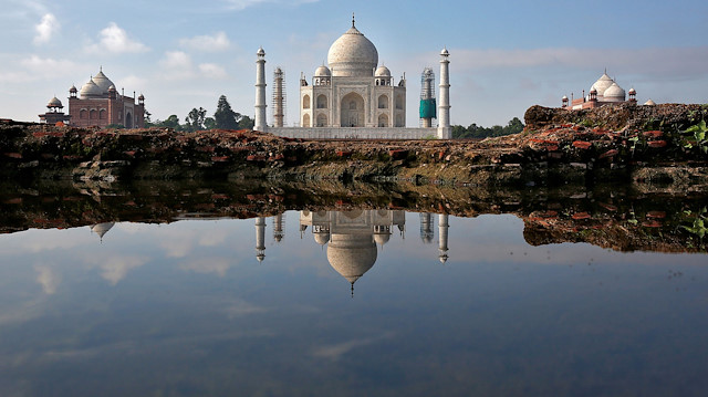 FILE PHOTO: The Taj Mahal is reflected in a puddle in Agra, India August 9, 2016. REUTERS/Cathal McNaughton/File Photo

