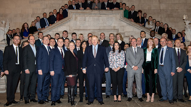 British Prime Minister Boris Johnson poses with newly-elected Conservative MPs