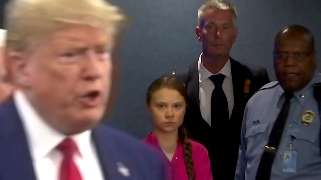 File photo: Swedish environmental activist Greta Thunberg watches as U.S. President Donald Trump enters the United Nations to speak with reporters in a still image from video taken in New York City, U.S. September 23, 2019