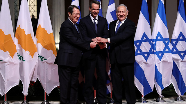 (From L to R) Cypriot President Nicos Anastasiades, Greek Prime Minister Kyriakos Mitsotakis and Israeli Prime Minister Benjamin Netanyahu pose for a photo before signing a deal to build the EastMed subsea pipeline to carry natural gas from the eastern Mediterranean to Europe, at the Zappeion Hall in Athens, Greece, January 2, 2020. REUTERS/Alkis Konstantinidis

