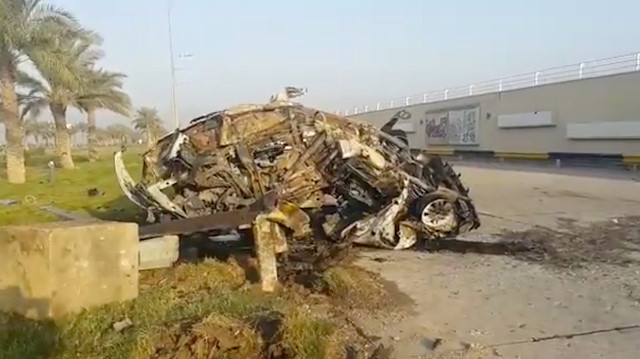 A damaged car, claimed to belong to Qassem Soleimani and Abu Mahdi al Muhandis