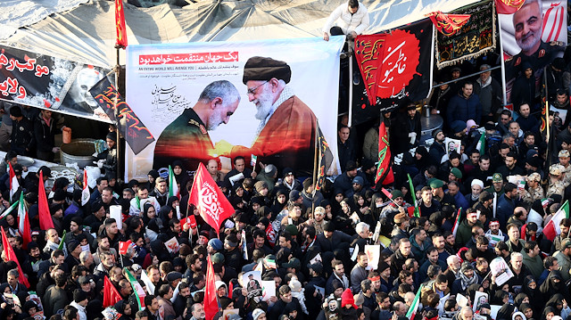 Iranian people attend a funeral procession for Iranian Major-General Qassem Soleimani, head of the elite Quds Force, and Iraqi militia commander Abu Mahdi al-Muhandis, who were killed in an air strike at Baghdad airport, in Tehran, Iran January 6, 2020