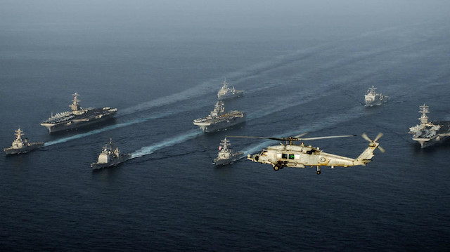Dünya enerji ticareti için kritik bir bölge olan Hürmüz'de çok sayıda Amerikan savaş gemisi bulunuyor.