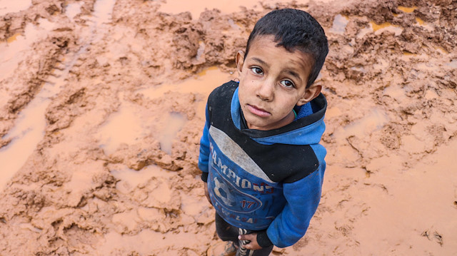 Syrian civilians' struggle against cold and mud in Idlib  