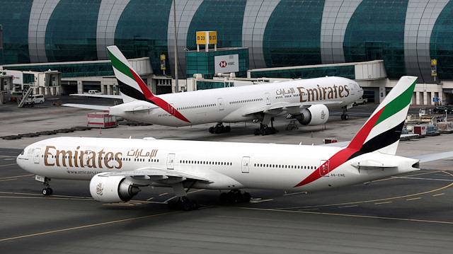 Emirates Airline Boeing 777-300ER planes are seen