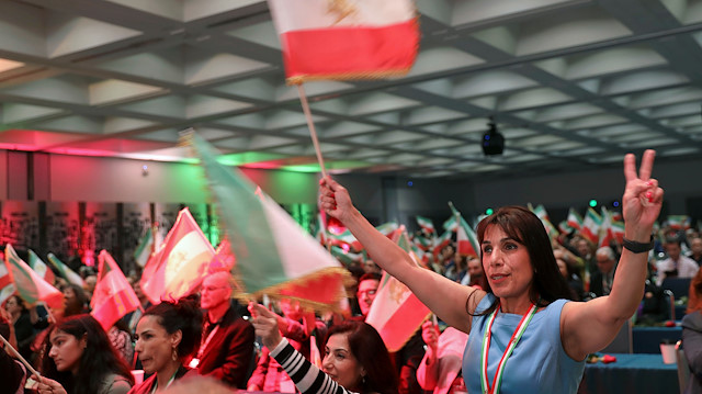 Attendees wave flags as Iranian Americans from across California converge in Los Angeles to participate in the California Convention for a Free Iran and to express support for nationwide protests in Iran from Los Angeles, California, U.S., January 11, 2020. REUTERS/ Patrick T. Fallon


