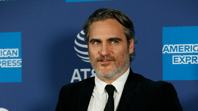 File photo: Actor Joaquin Phoenix poses backstage after receiving the Chairman’s Award for Joker