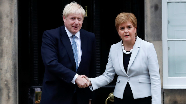 Britain's Prime Minister Boris Johnson & Scotland's First Minister Nicola Sturgeon