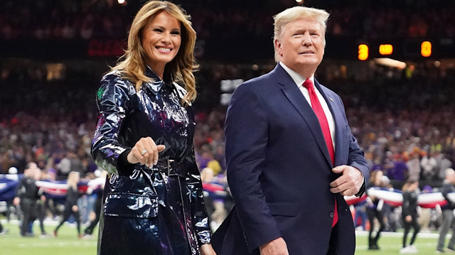 Jan 13, 2020; New Orleans, Louisiana, USA; President Donald J. Trump and First Lady Melania Trump walk off the field before the College Football Playoff national championship game between the Clemson Tigers and the LSU Tigers at Mercedes-Benz Superdome. Mandatory Credit: Kirby Lee-USA TODAY Sports

