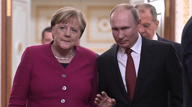Russian President Vladimir Putin and German Chancellor Angela Merkel 